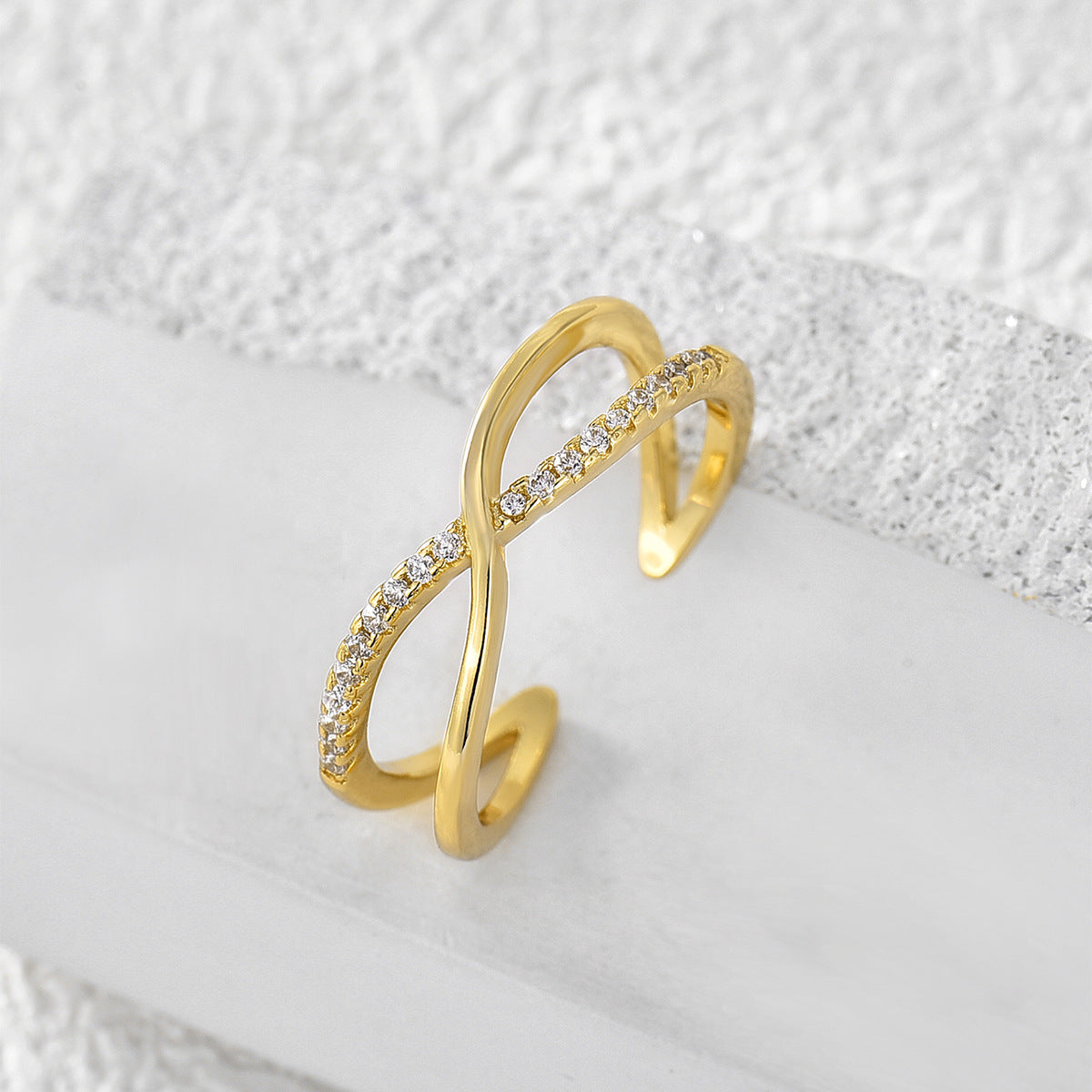 Cross set diamond ring
