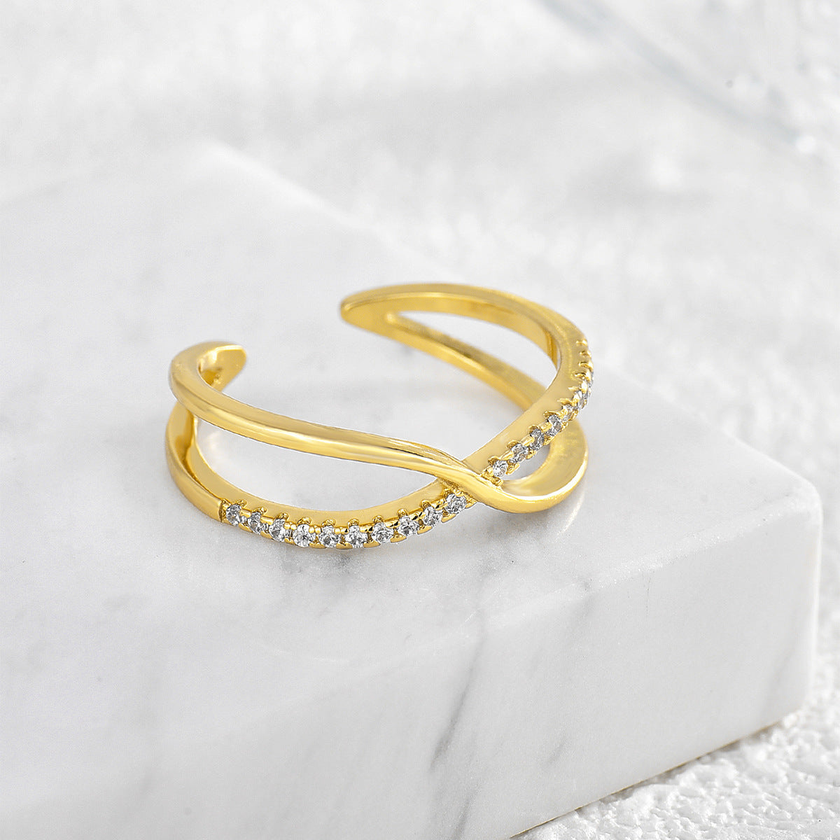 Cross set diamond ring